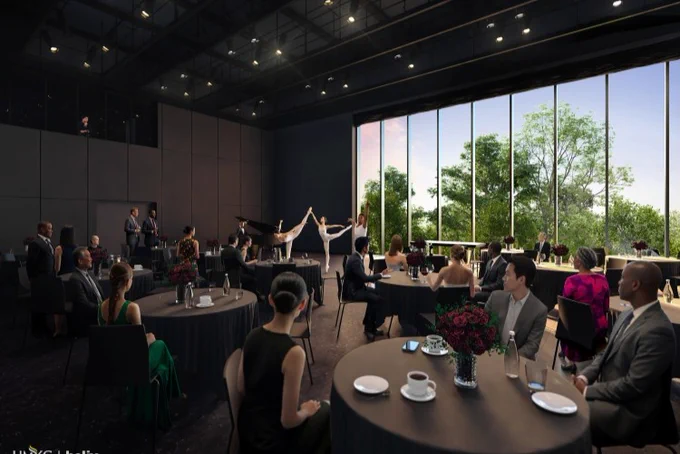 Concept rendering of black box theatre, which has dark walls and ceiling with a wall of windows. Rendering shows dancers performing in front of tables of seated audience.