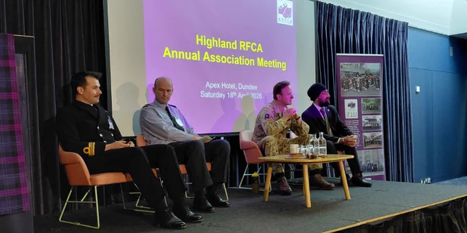Maritime Reserve Engagement Scotland and Northern Ireland Lieutenant Commander, Air Officer Scotland, 51 Infantry Brigade and Headquarters Scotland Assistant Commander, and Scottish Chambers of Commerce Chief Executive sitting on stage.
