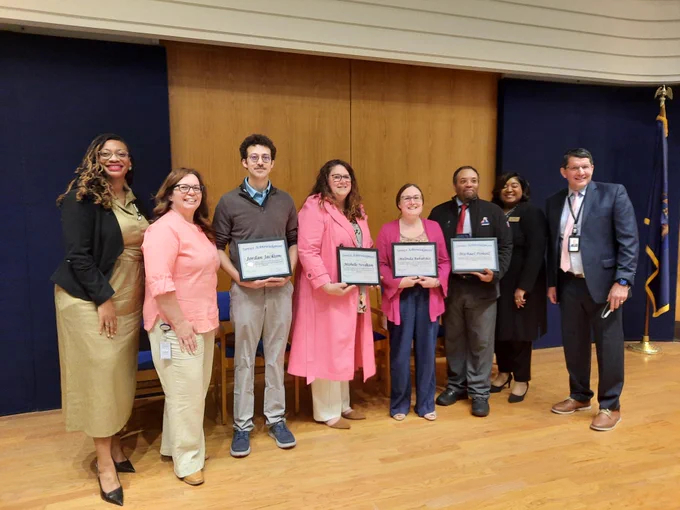 Group photo of MDE staff receiving their 5-year service awards, including Reference Librarian Mindy Babarskis.