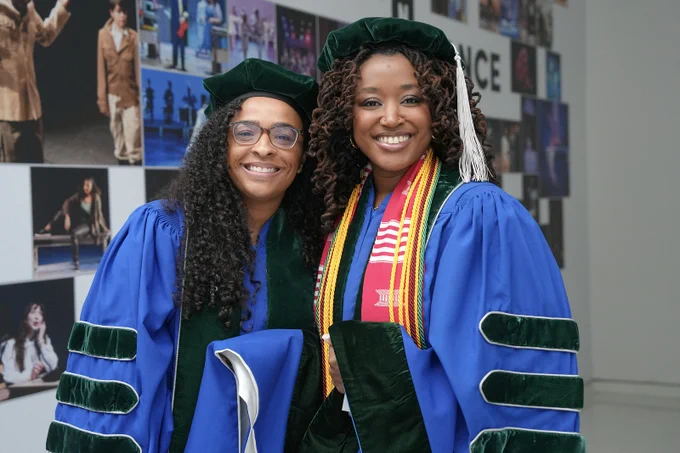 Graduates attend the Jacobs School of Medicine and Biomedical Sciences Commencement ceremony.