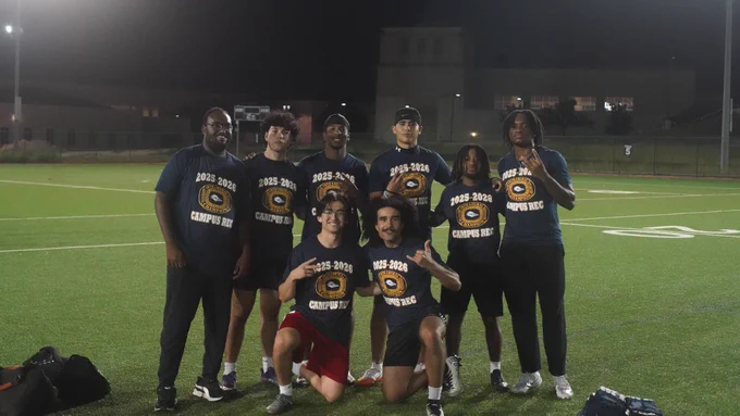 Single Dads players with champ shirts.