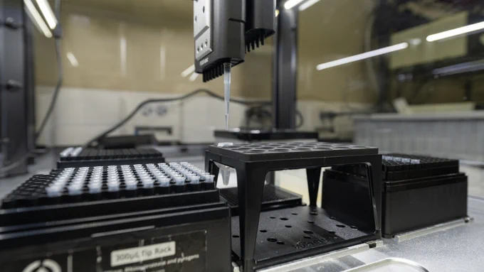Robotic liquid handler (Opentrons OT-2) setting up a multiplexed protein assay. 