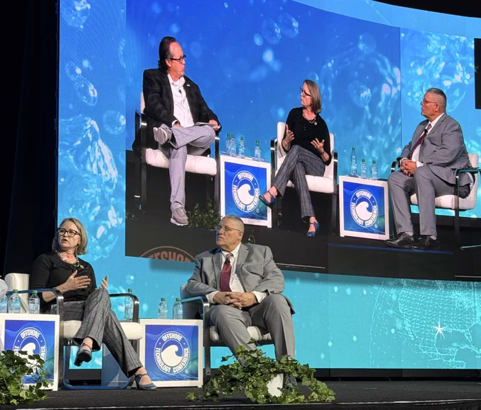 Dr. Megan Carr of BOEM and Bryan Domangue of BSEE are speaking during a fireside chat at the Offshore Technology Conference.