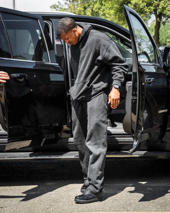 Sonny Styles getting out of a black car. 