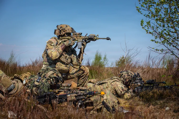U.S. Army Staff Sgt. Fahad Kasamba, an infantryman assigned to Echo Troop, 2nd Squadron, 2nd Cavalry Regiment, engages a simulated enemy position alongside fellow Soldiers during the force-on-force phase of Project Flytrap at Pabrad\u0117 Training Area, Lithuania, May 4, 2026. U.S. Soldiers faced off against British paratroopers from the U.K. Parachute Regiment in a series of simulated engagements designed to test counter-unmanned aerial system integration in a contested environment. From April 27 to May 31, 2026, U.S. and Allied forces will conduct Project Flytrap as part of a series of linked exercises, including Sword 26, Saber Strike, Immediate Response, and Swift Response, which transform experimentation into capability. During Project Flytrap, Soldiers integrate counter-unmanned systems, AI-enabled command and control, and live data networks to move faster, decide faster, and fight more effectively across all domains. (U.S. Army photo by Sgt. Max Elliott)