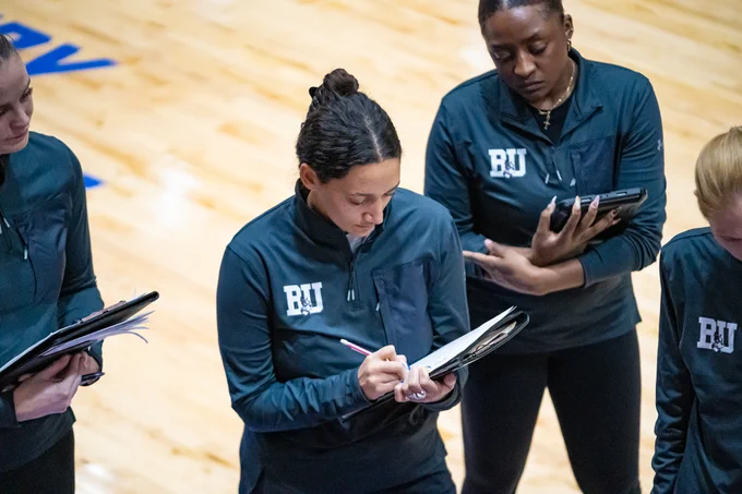 Kourtni Stevenson writing down notes.