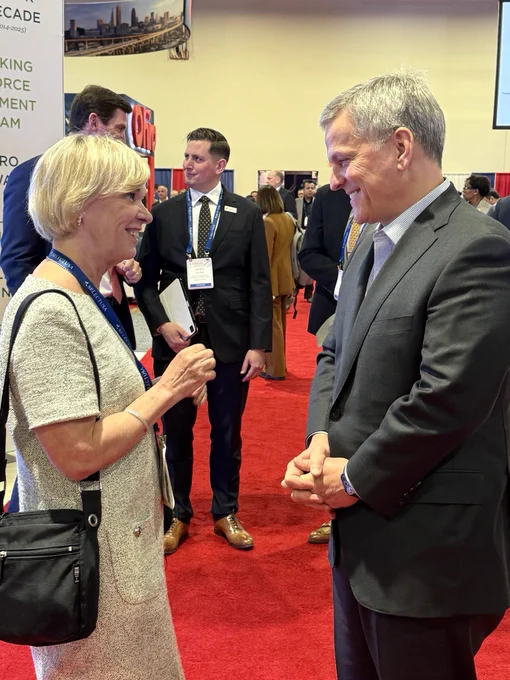 Ambassador and Governor Stein speaking and smiling.