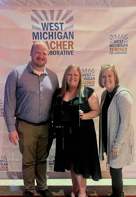 HR team posing with new program completion staff