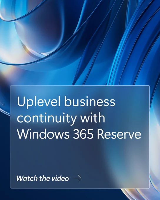 Abstract blue and silver flowing shapes form a modern background. A translucent text box reads “Uplevel business continuity with Windows 365 Reserve,” with a call to action beneath that says “Watch the video” and a right arrow.