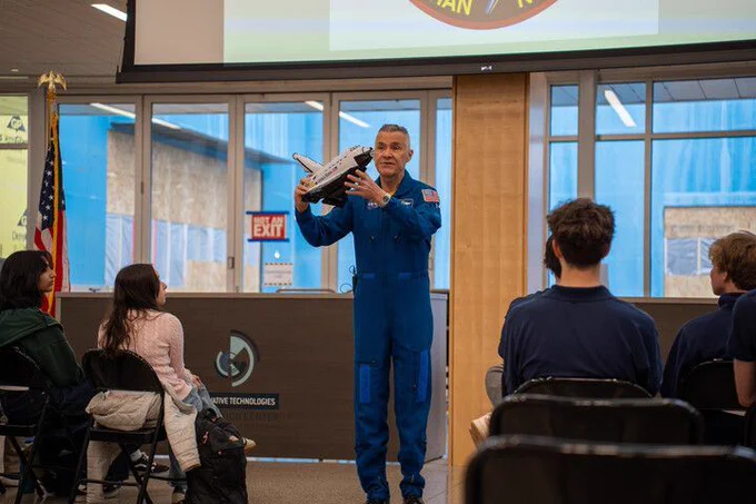 A former astronaut speaks at the Innovation Center.