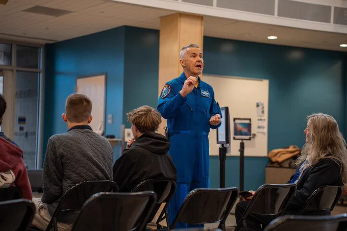 A former astronaut speaks at the Innovation Center.