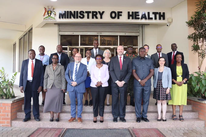 Ambassador Popp and Health Minister Dr. Jane Ruth Aceng pose for a photo with the new Joint Health Steering Committee.