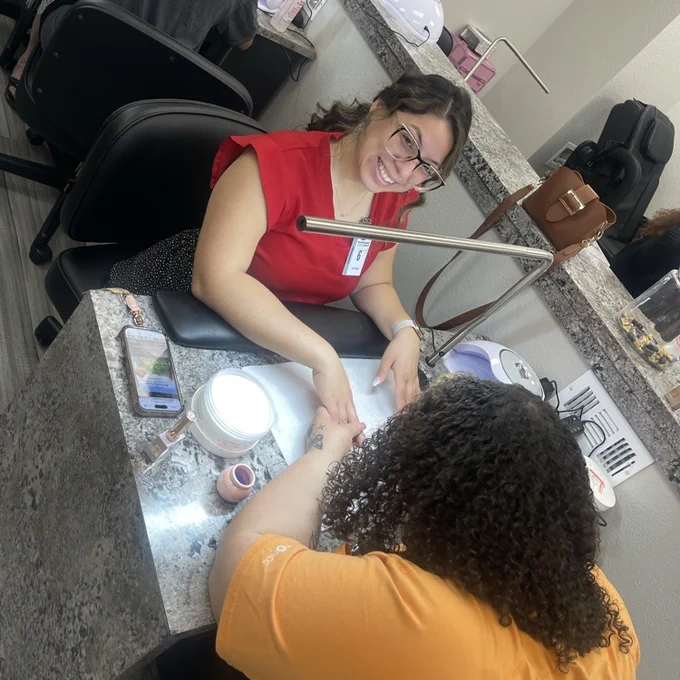 woman getting manicure 