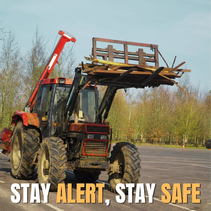 Image of a tractor on a rural road.

Text overlays image and reads "Stay Alert, Stay Safe."