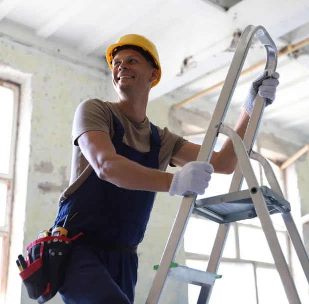 A smiling construction worker.