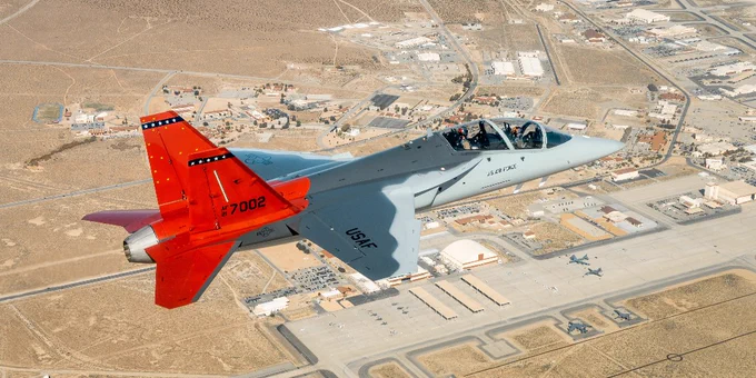 A T-7A Red Hawk soars over Edwards Air Force Base, California.
