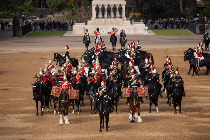 The mounted band performs on horse guards as the cavalry ranks past the guards memorial