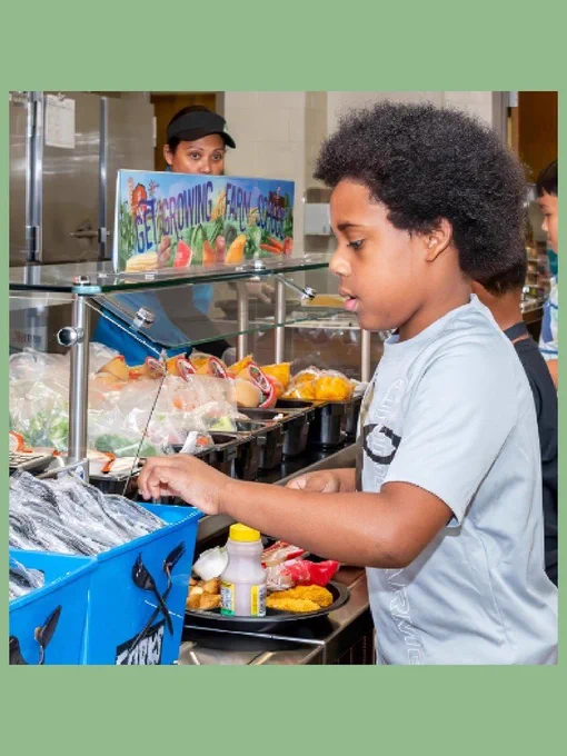 Student purchasing a school meal