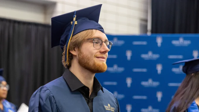 Portrait shot of male Wake Tech graduate.