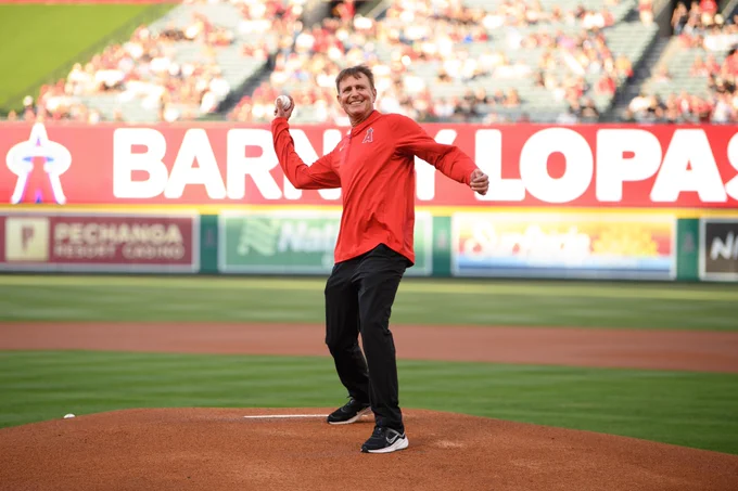 Angels Director of Field/Ground Maintenance Barney Lopas throws out the ceremonial first pitch on the mound at Angel Stadium. 