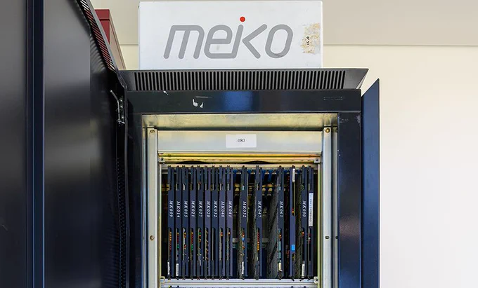 Photo shows logo and upper cabinet of Meiko computing system