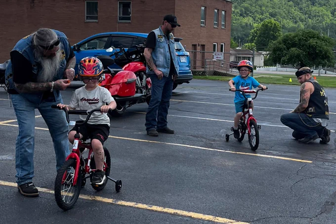 Students with new bikes.
