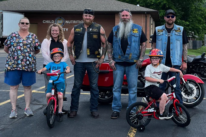 Students with new bikes.