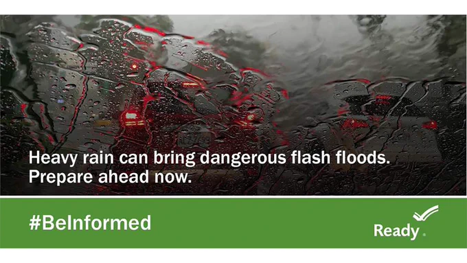 Heavy rain on an automobile windshield and the message that heavy rains can bring flash flooding so prepare ahead for that possibility.