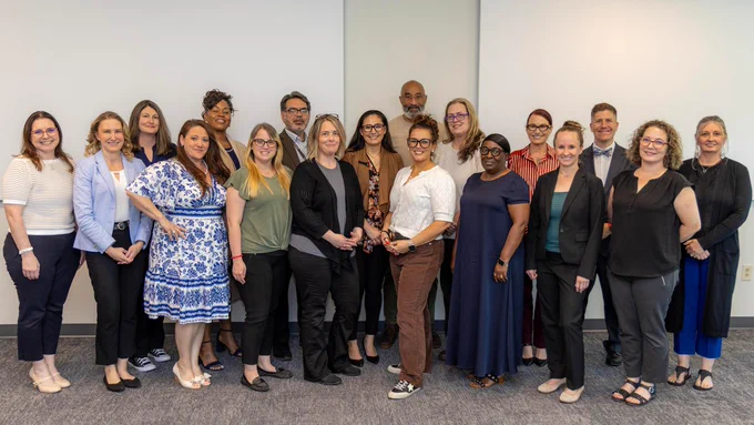 Army CID wellness team pose for a group photo during their 2026 Wellness Symposium.