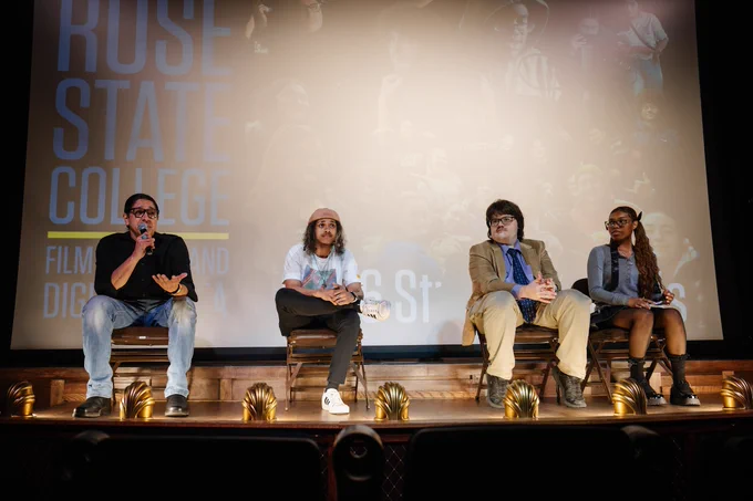 Four RSC students sit on stage for the panel discussing their capstone films.