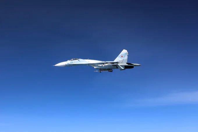 A Russian Su-27, seen here alongside an RAF Rivet Joint aircraft over the Black Sea.