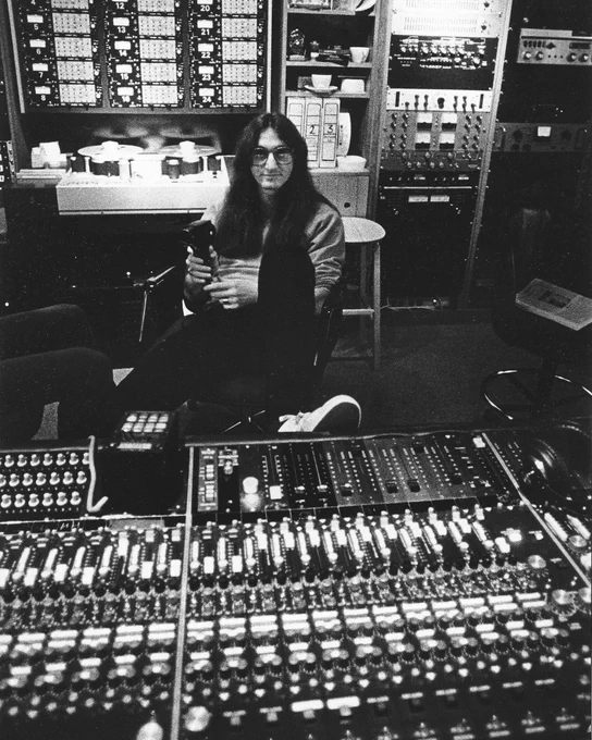 Geddy Lee of Rush sitting at the Trident A-Range console in Quebec's Le Studio