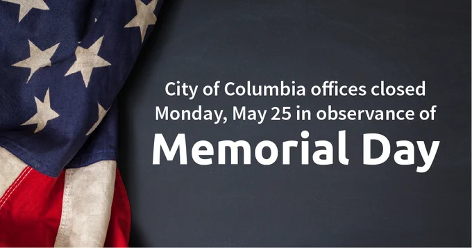 American flag draped on left with text announcing City of Columbia offices closed May 25 for Memorial Day observance.
