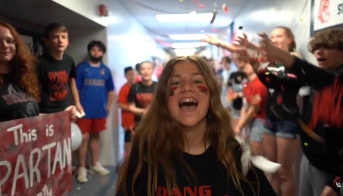 middle school student lip singing in the halls of Pleasant School