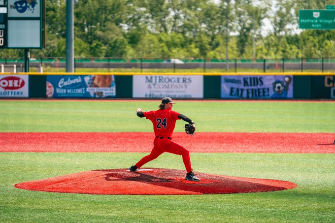 Keegan Johnson in a red Ball State baseball uniform throwing a pitch