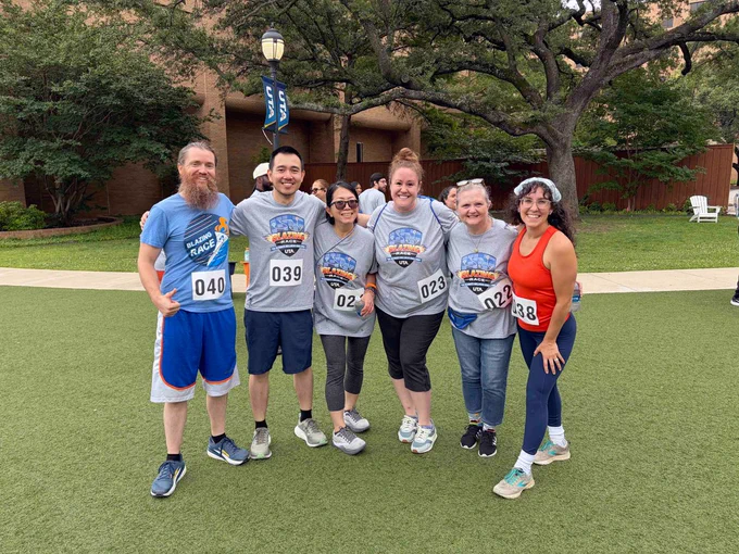 Pictured is a photo of six UTA Libraries staff members posing for a group photo at the Blazing Race event.