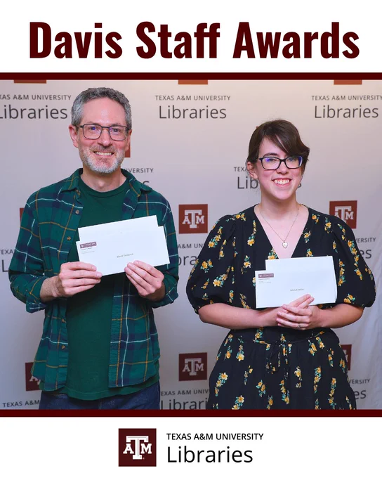 Davis Staff Awards. The two award winners standing side by side and smiling. 