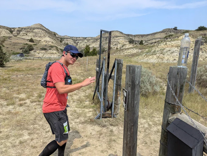 You could be saying, ‘Stepping through the gate and into my new office: a wide‑open campsite, a trusty picnic table, and four days a week of helping happy campers at CCC Campground. Not all heroes wear capes… some wear name badges!’ Pictured is a runner charging along the exciting Maah Daah Hey TrailRun—maybe even thinking that very thought. Forest Service photo by Scott C. Marvin.
