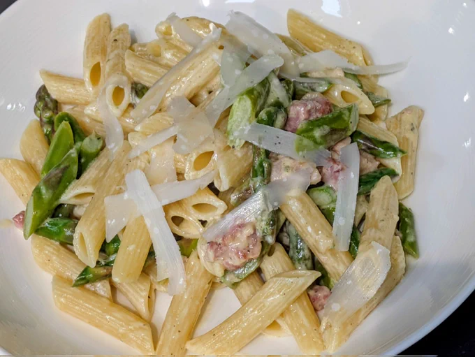 The aspagus in it's sauce, mixed with penne and topped with extra parmesan shavings. 