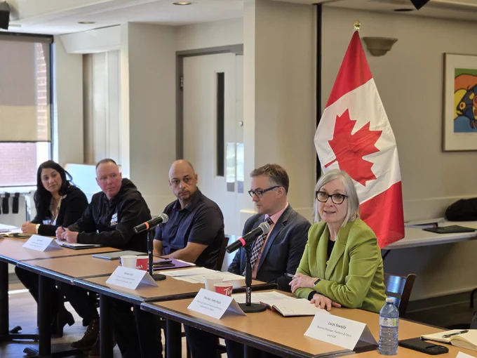 Minister Hajdu speaking with event participants