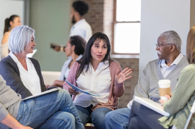 People taking part in a group discussion