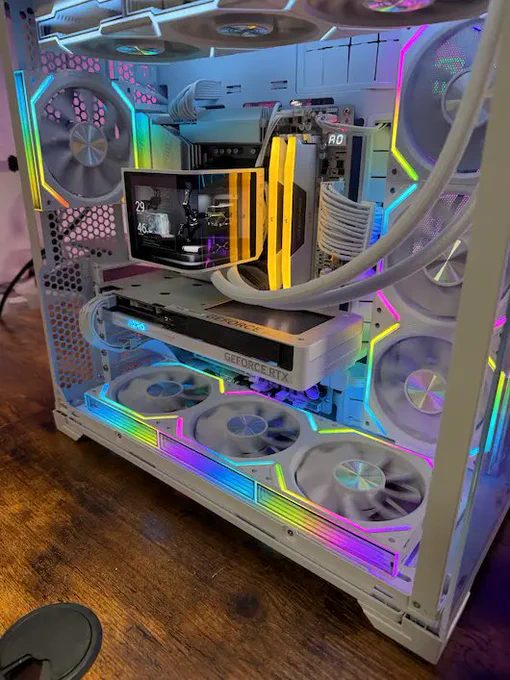 High‑end gaming PC with RTX GPU, liquid cooling, and RGB airflow setup, highlighting proper hardware condition when deciding GPU repair vs replacement