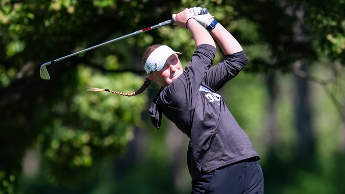 Allison Meyerink in the back end of her golf swing, photo by Jaime Crawford / JC Sports Photos