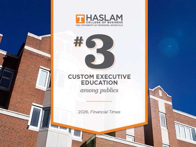 A building with red brick and white accents under a clear blue sky. Overlaid is a banner reading: "HASLAM College of Business, The University of Tennessee, Knoxville. #3 Custom Executive Education among publics, 2026, Financial Times.