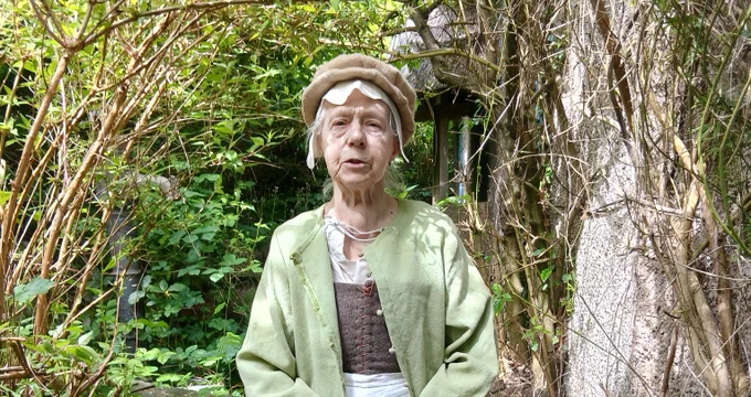 Alison Coates dressed in Tudor clothes.
