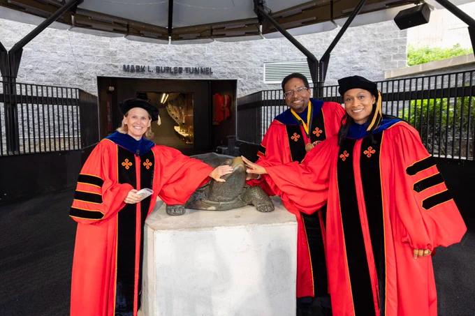 President Pines, Dr. Jeanette Epps, and Provost Rice pose with a statue of UMD’s mascot, Testudo.