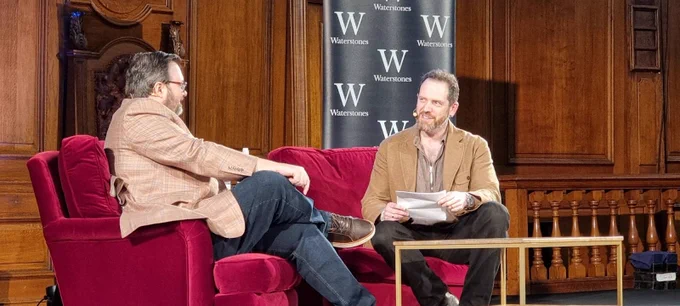 Brandon Sanderson and Joe Abercrombie discussing fantasy at the Emmanuel Centre in London, 21 May 2026.