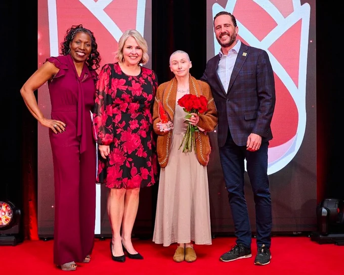 Morrison Center ticket operations supervisor Paige Thomas during the 2026 ROSE (Recognition of Service Excellence) Award holding her trophy. 
