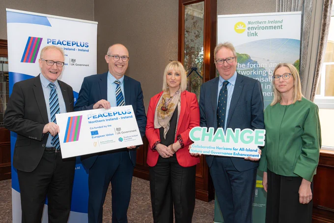 Guests and speakers pictured at the PEACEPLUS launch event for the CHANGE project