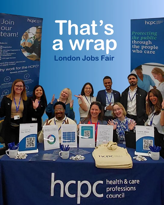 People standing behind a Health and Care Professions Council (HCPC) exhibition table. The table displays informational boards with QR codes and printed materials. Two large blue HCPC banners stand on either side, one inviting people to join the team and the other highlighting “Protecting the public through the people who care.” Large text above the group reads, “That’s a wrap, London Jobs Fair.” The group poses together behind the display in a bright, event-style setting.